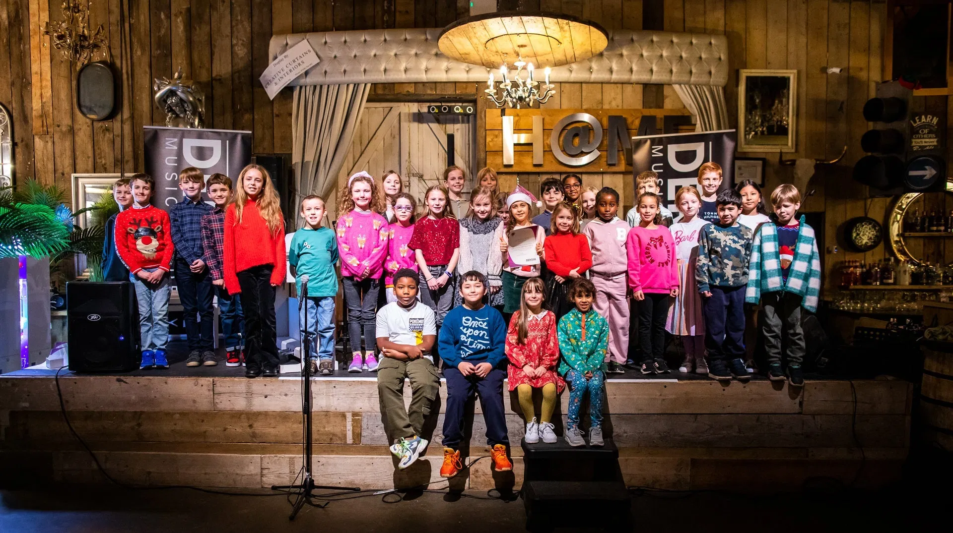 DeRosa Music Buntingford students together on stage at their showcase